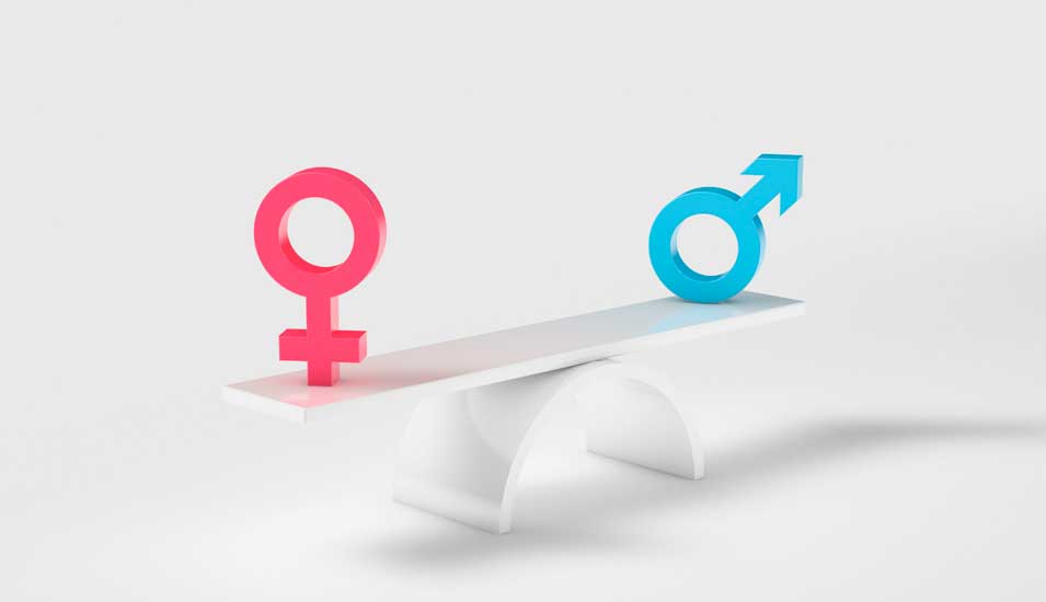 Symbolbild Geschlechtergerechtigkeit: Symbole für männliches und weibliches Geschlecht auf einer ausbalancierten Wippe
